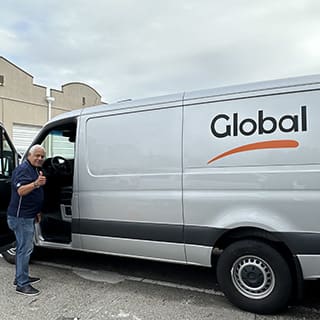 Global AirServices, LLC technicians working on aircraft components