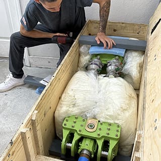 Global AirServices, LLC technicians working on aircraft components