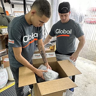 Global AirServices, LLC technicians working on aircraft components