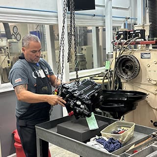 Global AirServices, LLC technicians working on aircraft components