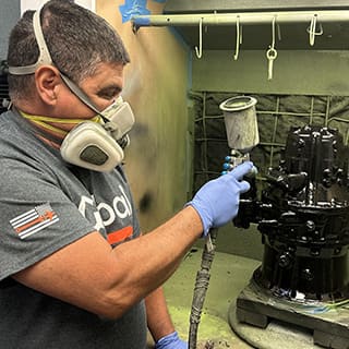 Global AirServices, LLC technicians working on aircraft components