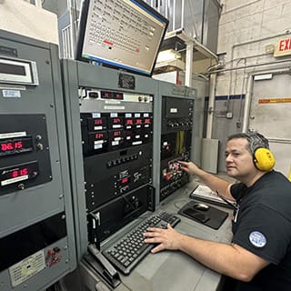 Global AirServices, LLC technicians working on aircraft components
