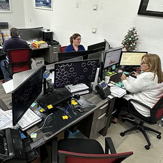 Global AirServices, LLC technicians working on aircraft components